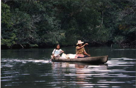 Maya-familiy on sidearm of Rio Dulce